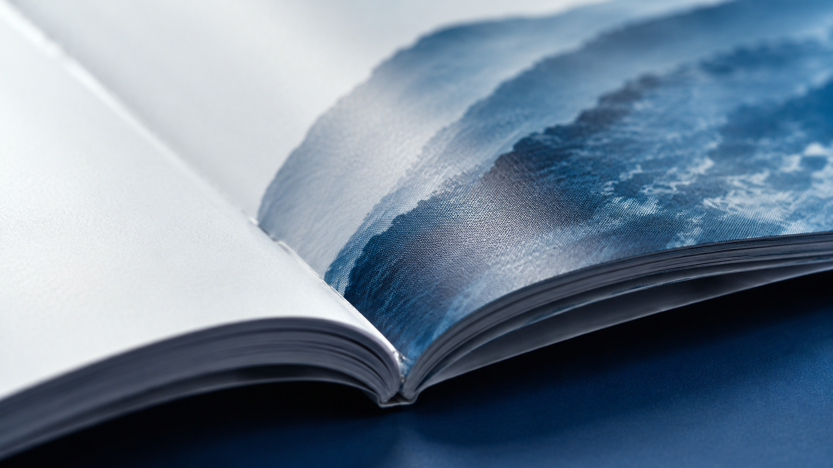 Macro detail of a finished printed brochure showing paper texture and print finish